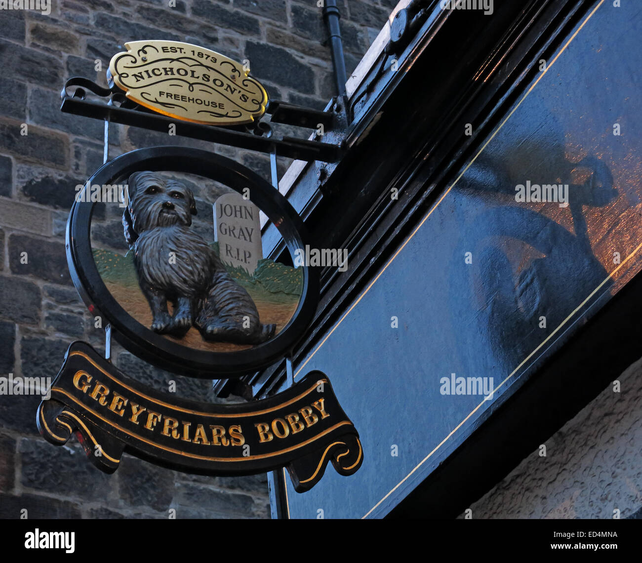 Greyfriars Bobby historic pub sign outside at dusk, Edinburgh Old Town, Dog outside, Lothians, Scotland, UK Stock Photo