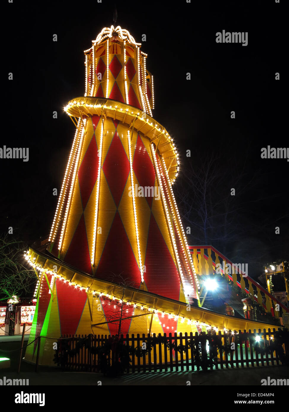 Traditional fairground attractions, the big slide  at Night at Edinburgh's Hogmanay Stock Photo