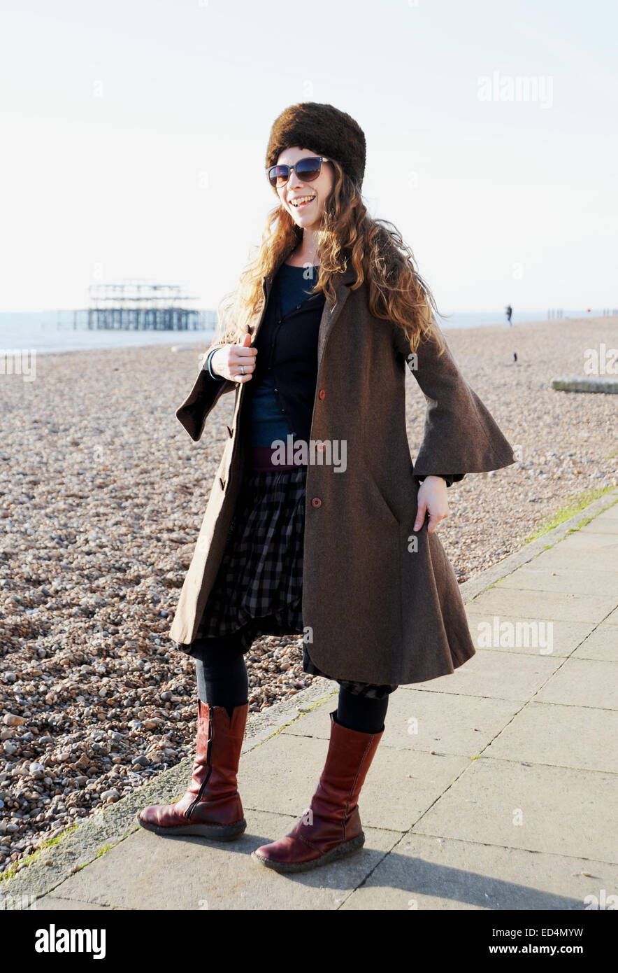 Young woman on beach wearing hat hi-res stock photography and images ...