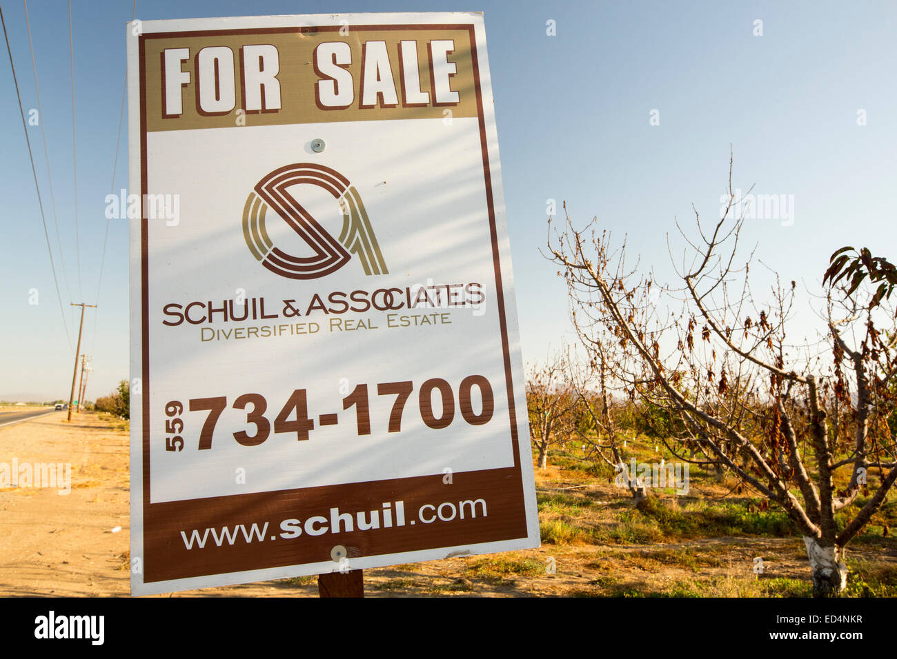 A farmer trying to sell up his land that can no longer grow crops due