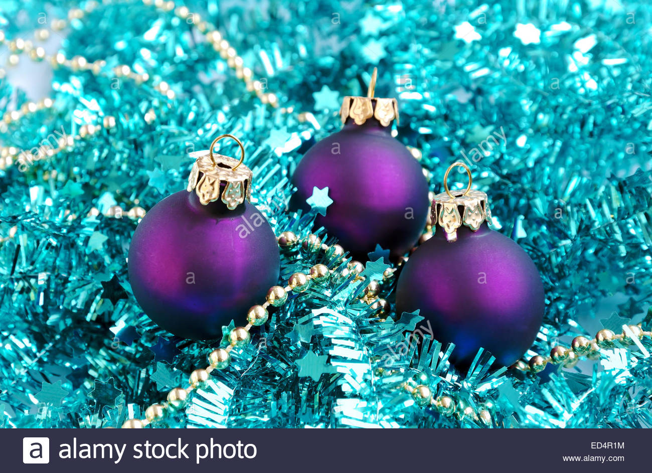 Christmas Decoration With Blue Metallic Tinsel And Purple Balls