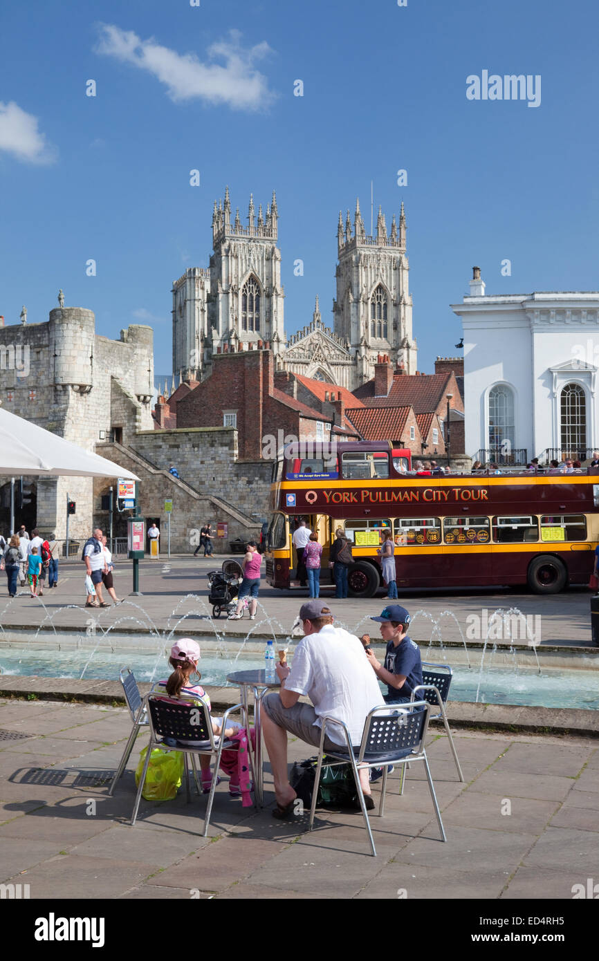 Tourists in St Leonards Square York, Bootham Bar and York Minster, North Yorkshire, England. Stock Photo