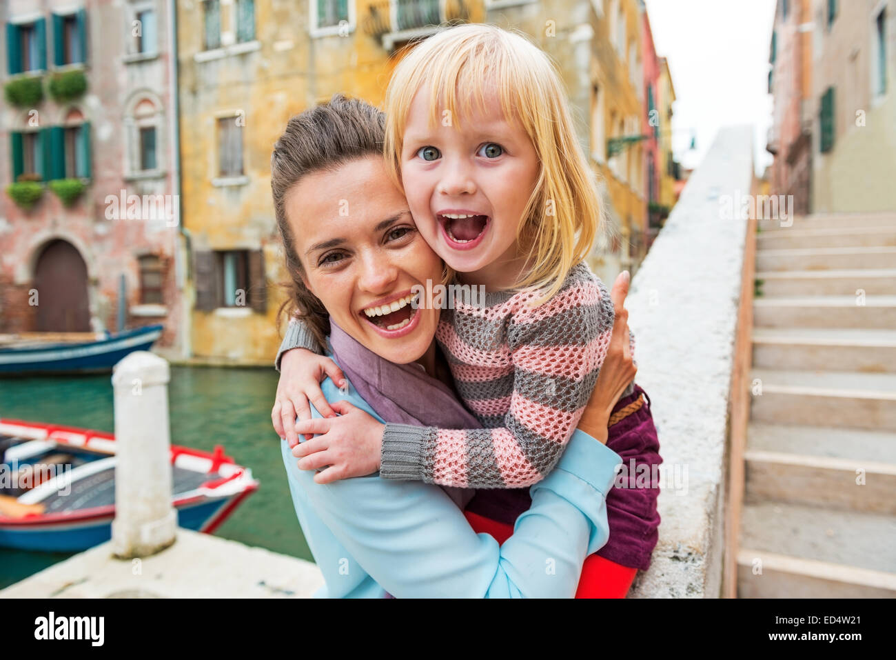 Portrait of happy mother and baby girl in venice, italy Stock Photo