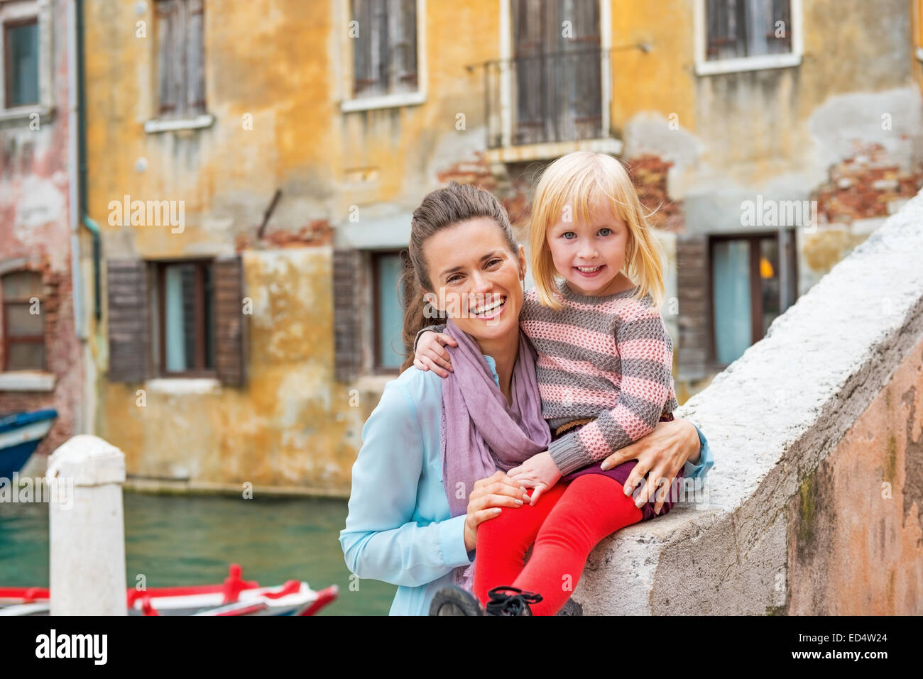 Portrait of smiling mother and baby girl in venice, italy Stock Photo