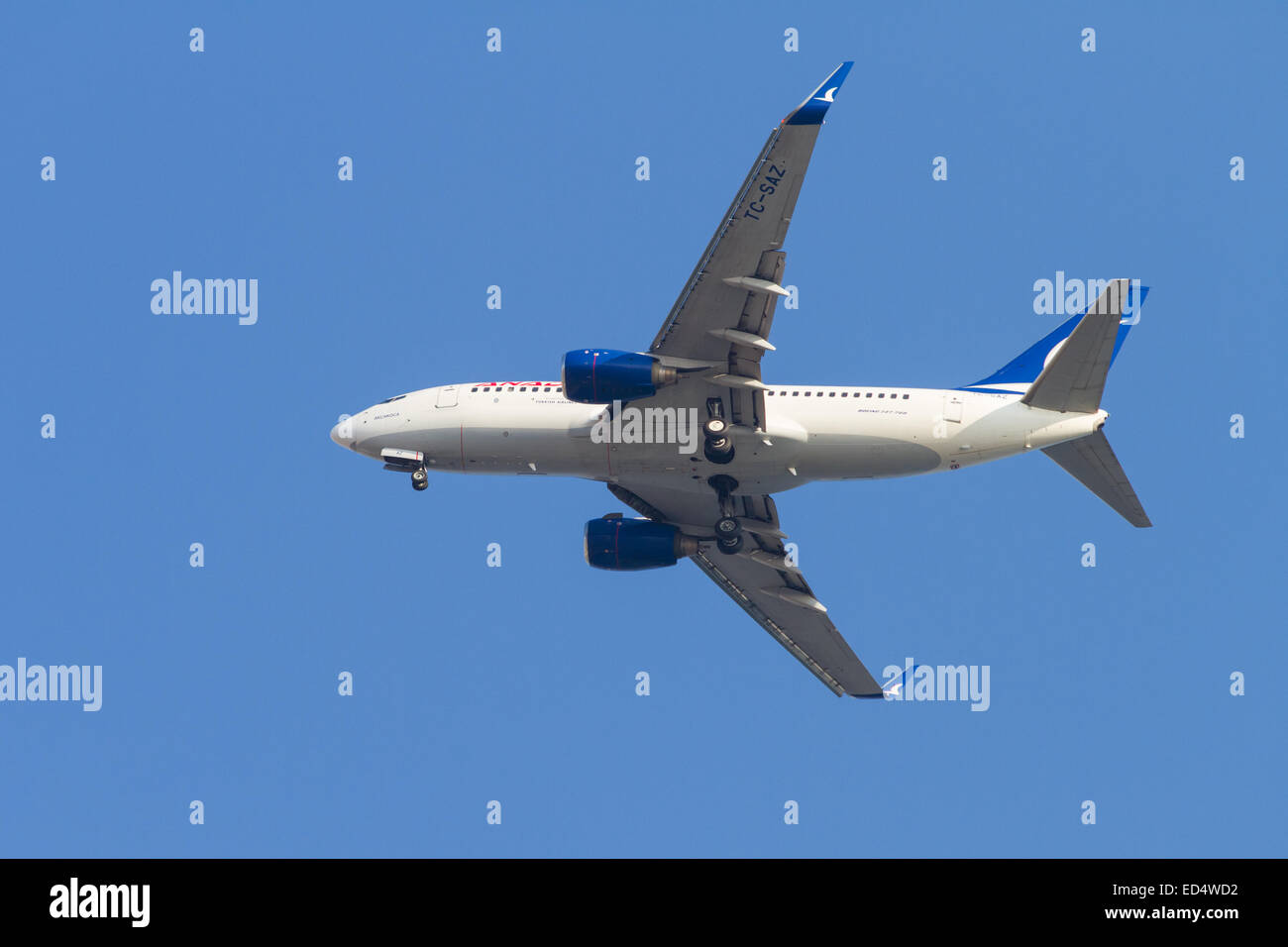 ISTANBUL, TURKEY - AUGUST 17, 2014: Anadolu Jet Airlines Boeing 737-700 landing to Sabiha Gokcen Airport. AnadoluJet is low-cost Stock Photo