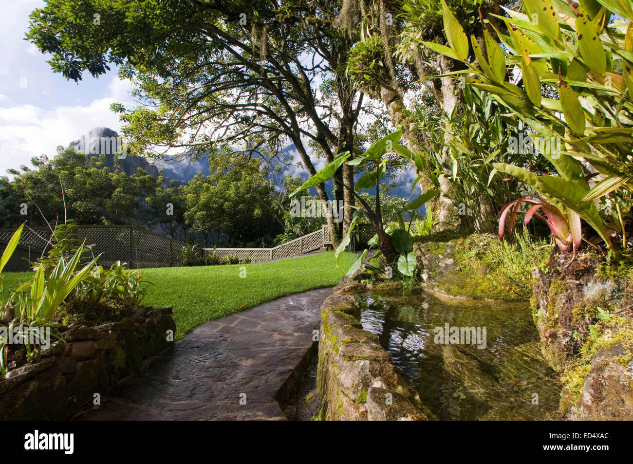 Belmond Sanctuary Lodge - Hotel in Machu Picchu, Peru. Gardens of Machu Picchu Sanctuary Lodge. Located in the back of the build Stock Photo
