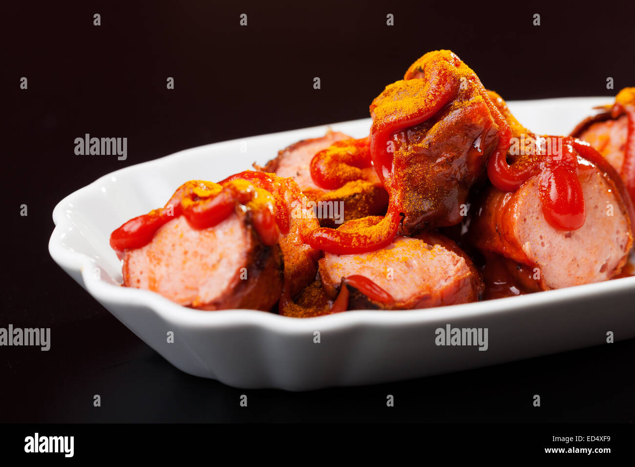 closeup of a german curried sausage Stock Photo Alamy