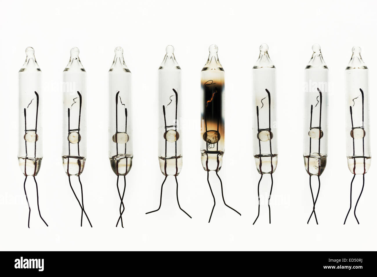 rows of tungsten filament light bulbs showing signs of metal ionization