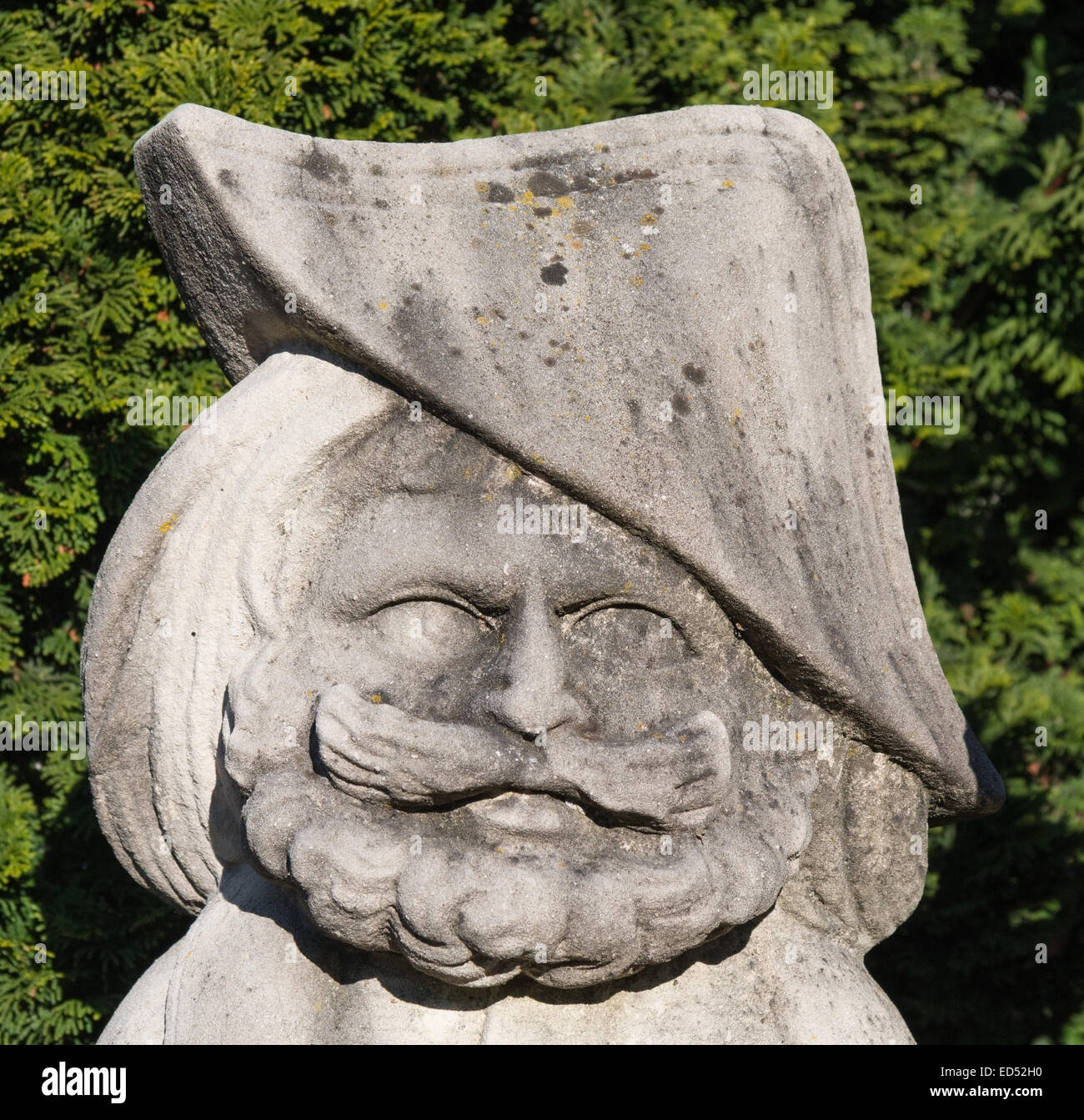 Statue in home garden on verdant background Stock Photo - Alamy