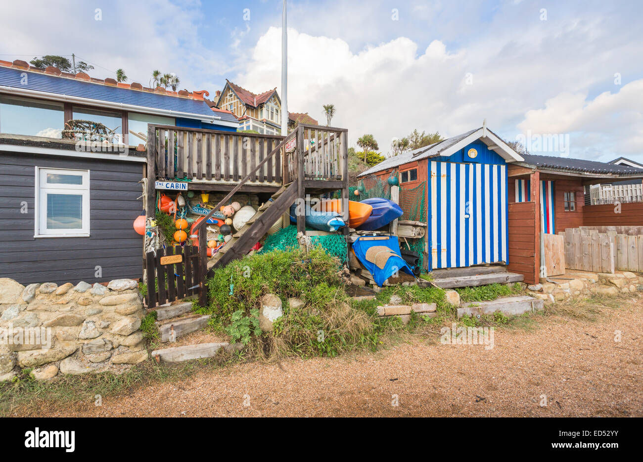 Beach hut with blue and white striped doors at Steephill Cove, a bay  near Ventnor, Isle of Wight, Hampshire, UK Stock Photo