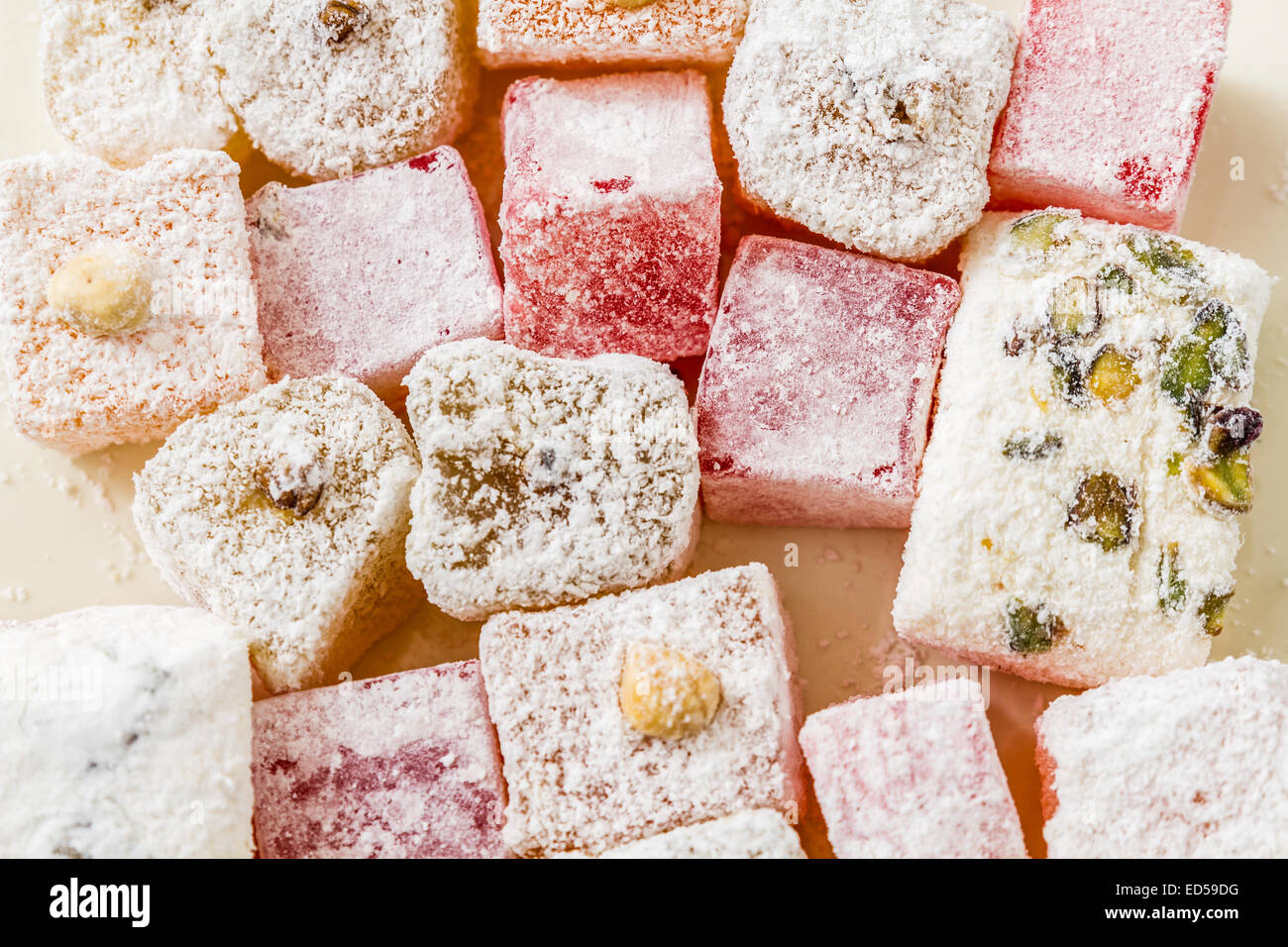 Assortment of Turkish Delight on wooden white background Stock Photo