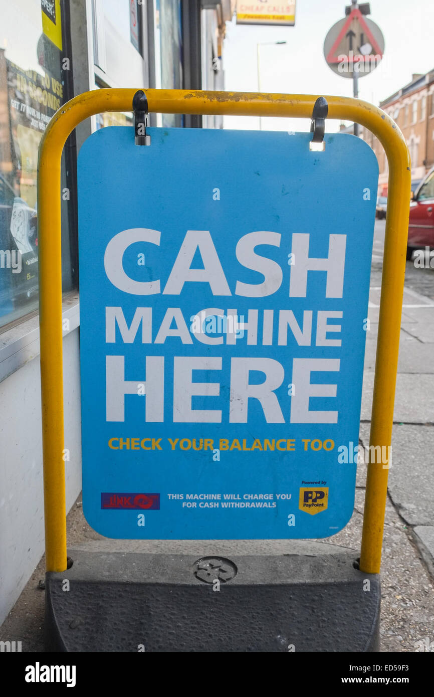 ATM Cash machine charging sign charge withdrawals UK Stock Photo Alamy