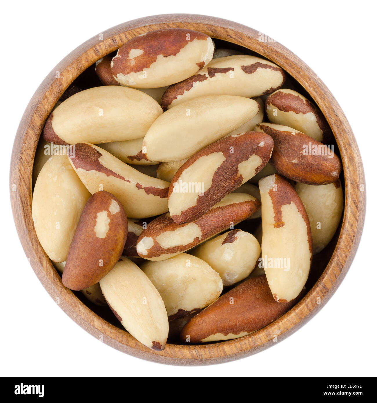 Bowl With Brazil Nuts. Raw brazil nuts in a wooden bowl from above, isolated on white background