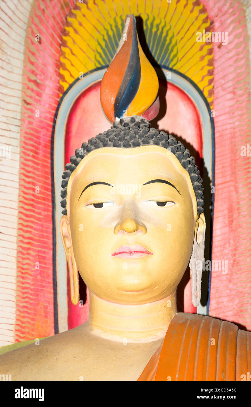 Buddha closeup. Interior of buddhist monastery Wewurukannala Vihara with Buddha statues in Dickwella, Sri Lanka Stock Photo