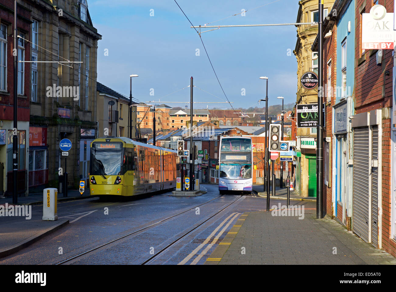 Tram and bus on Drake Street, Rochdale, Lancashire, England UK Stock