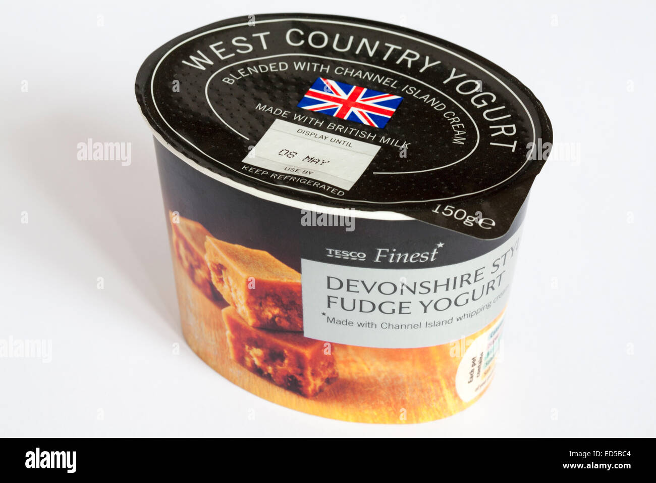 pot of Tesco Finest Devonshire style fudge yogurt with isolated on white background Stock Photo