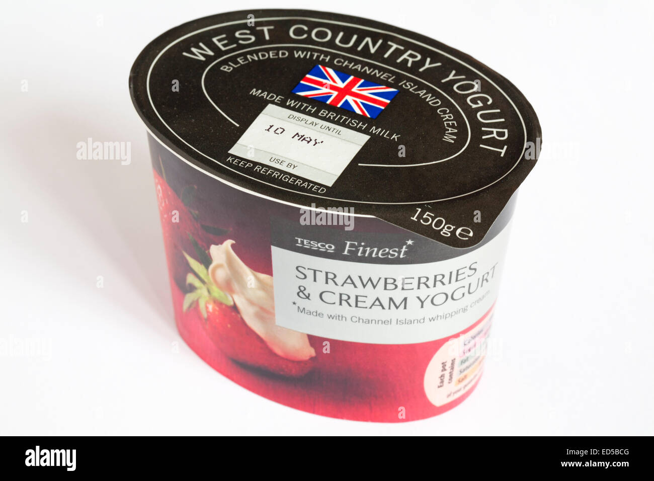 pot of Tesco Finest Strawberries & Cream yogurt isolated on white background Stock Photo