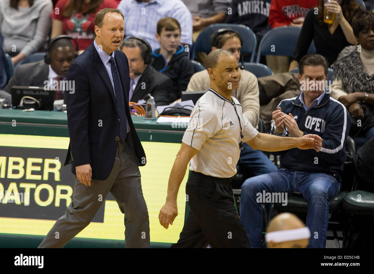 Milwaukee, WI, USA. 27th Dec, 2014. Atlanta Head Coach Mike Budenhoizer questions a call with Referee Danny Crawford during the NBA game between the Atlanta Hawks and the Milwaukee Bucks at the BMO Harris Bradley Center in Milwaukee, WI. Atlanta defeated Milwaukee 90-85. John Fisher/CSM/Alamy Live News Stock Photo