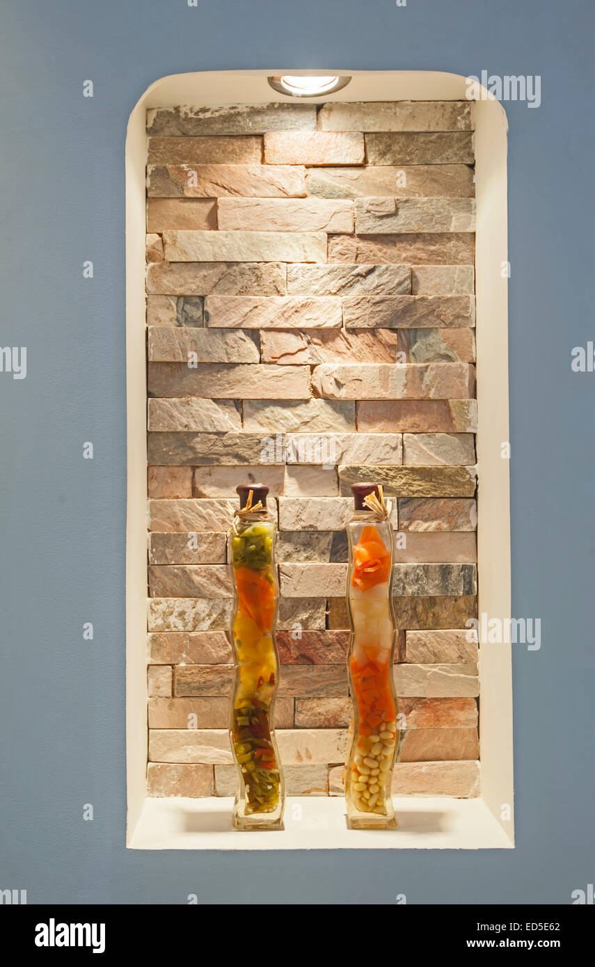 Decorative glass jars in an alcove on living room wall Stock Photo Alamy