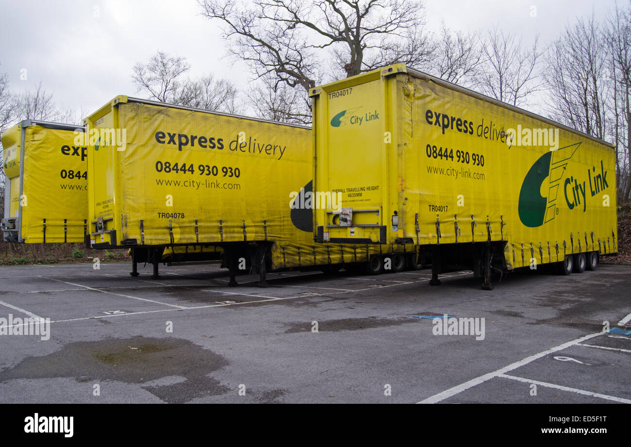 BASINGSTOKE, UK - DECEMBER 27, 2014:  Large trailers parked at the Basingstoke depot of City Link. Stock Photo