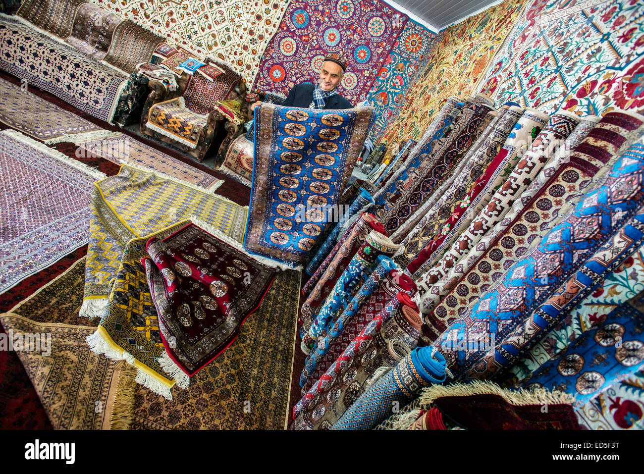 Carpets shop-gallery at the Samarkand-Bukhara Silk Carpets workshop, Samarkand, Uzbekistan Stock Photo