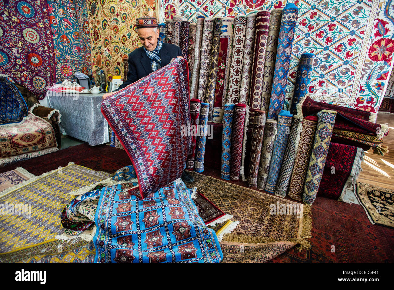 Carpets shop-gallery at the Samarkand-Bukhara Silk Carpets workshop, Samarkand, Uzbekistan Stock Photo