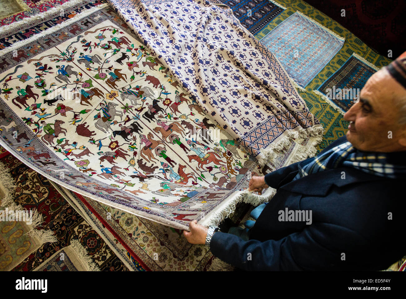 Carpets shop-gallery at the Samarkand-Bukhara Silk Carpets workshop, Samarkand, Uzbekistan Stock Photo