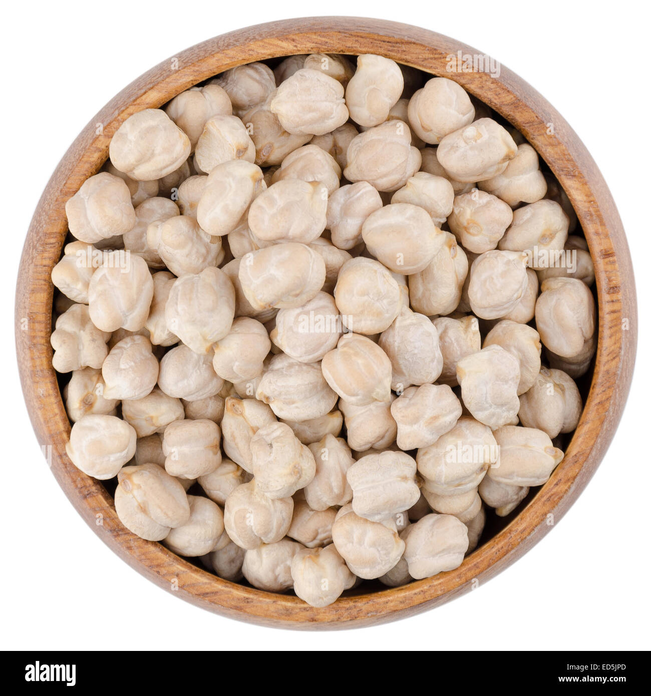 White Chickpeas in a Bowl. White chickpeas in a wooden bowl from above, isolated on white background. Stock Photo