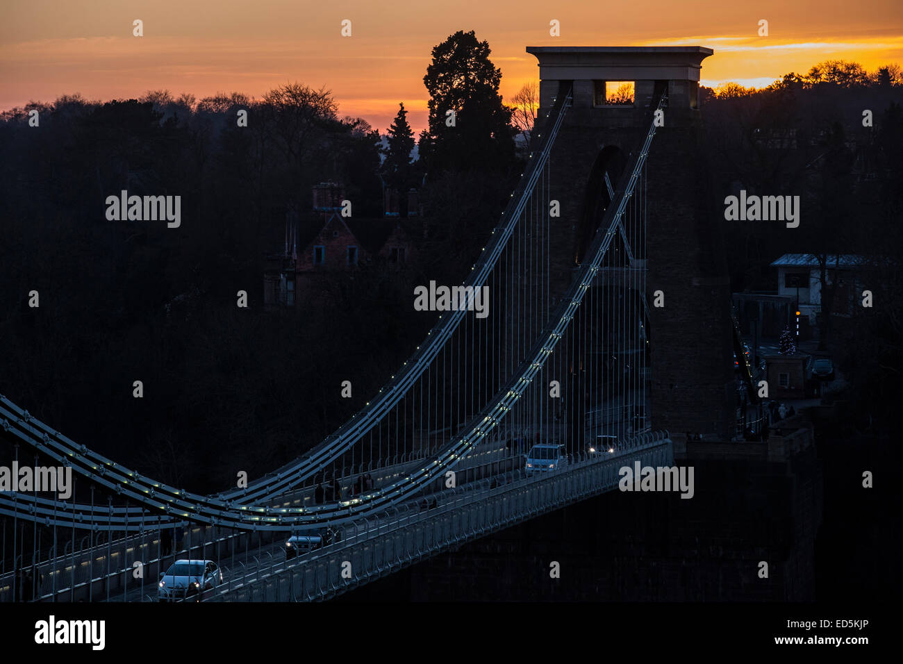 Bristol, UK. 28th December, 2014. The sun sets over Clifton Suspension Bridge, Bristol, UK. Credit:  james beck/Alamy Live News Stock Photo