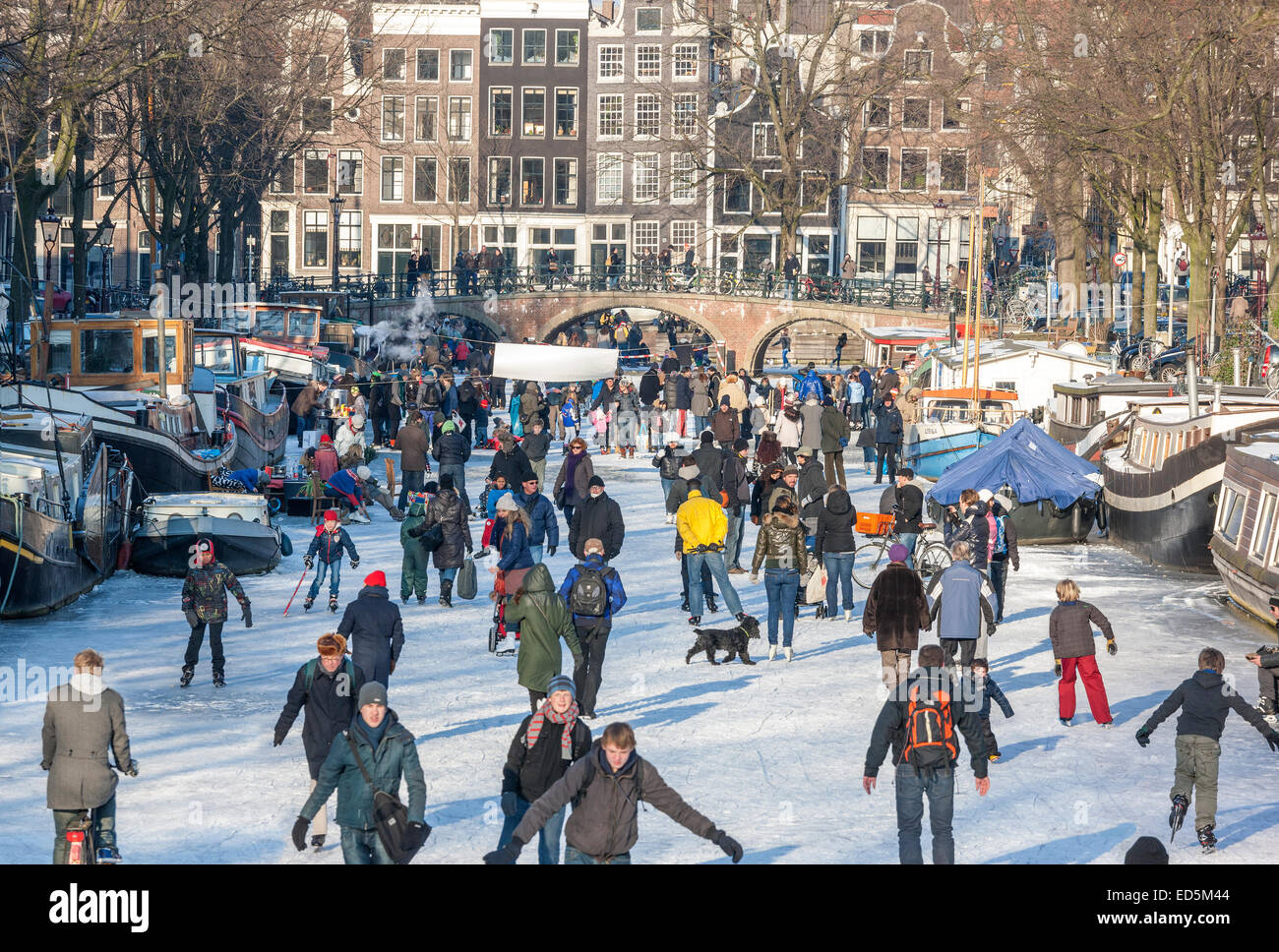 Amsterdam Ice Skating on a frozen Canal in winter. Keizersgracht and