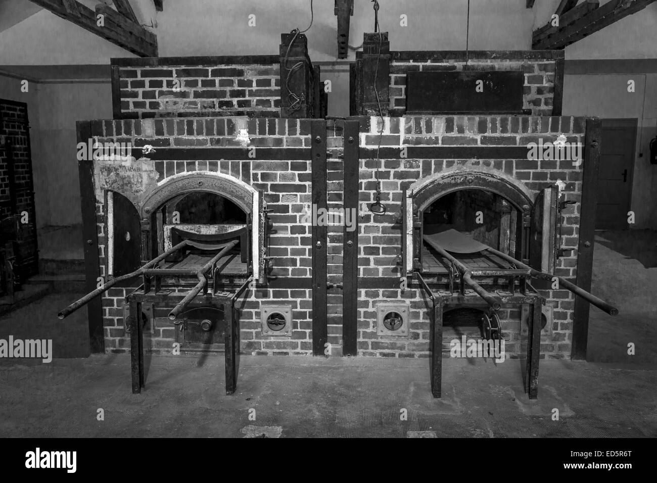 Vintage looking black and white photo of crematorium #2 at the Dachau concentration camp in Germany. Stock Photo