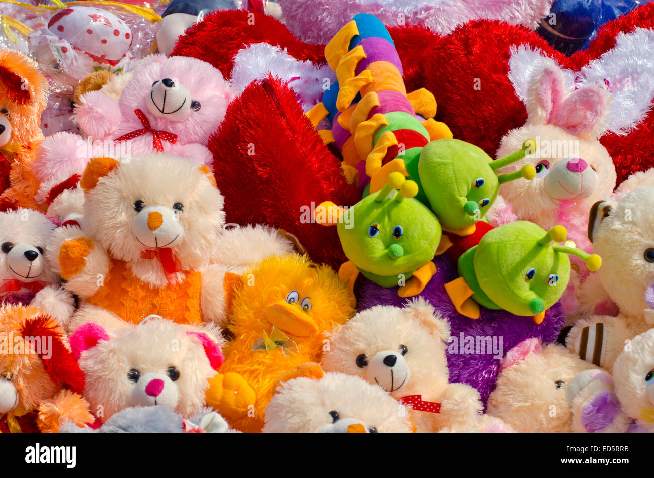 many beautiful colorful soft kids toys  in market Stock Photo