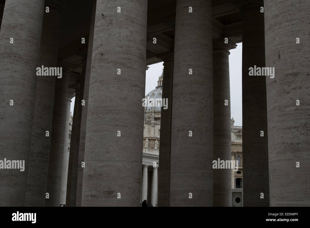 Saint Peter Cupola seen through the Bernini's colonnade Stock Photo