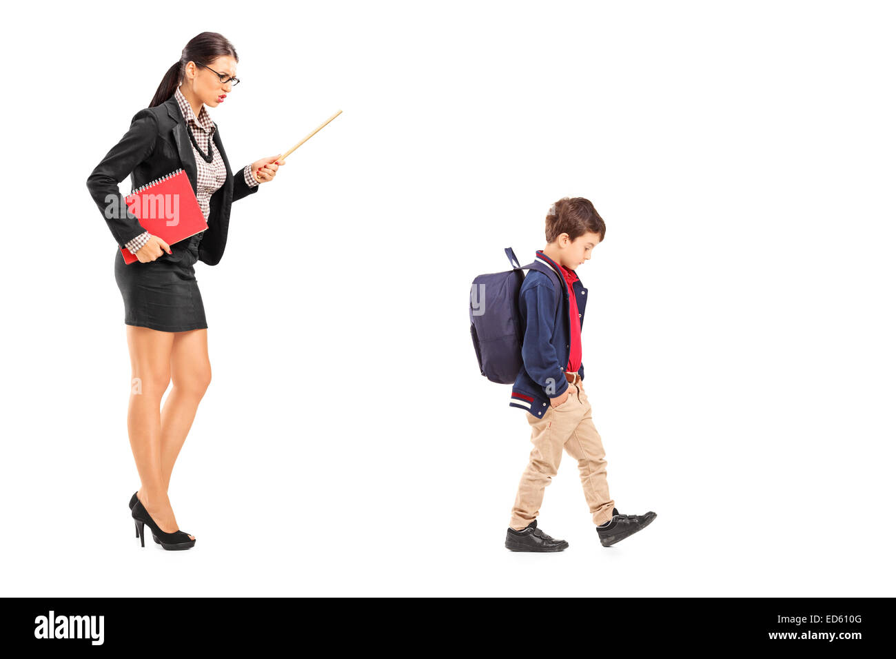 Female teacher disciplining a schoolboy isolated on white background Stock Photo