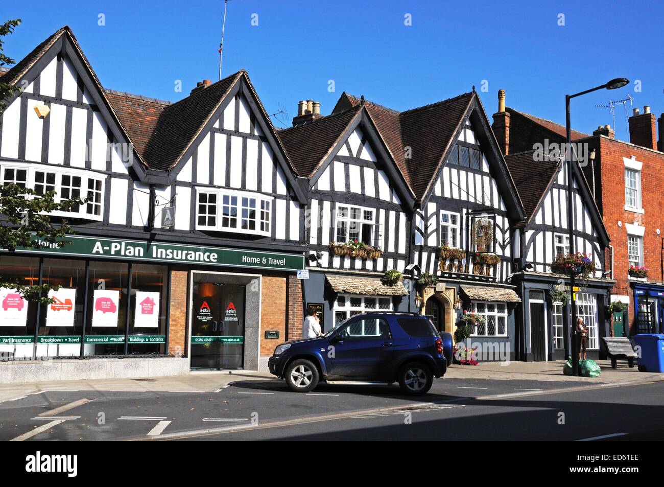 Timbered buildings including the Royal Oak Pub along Vine Street in the