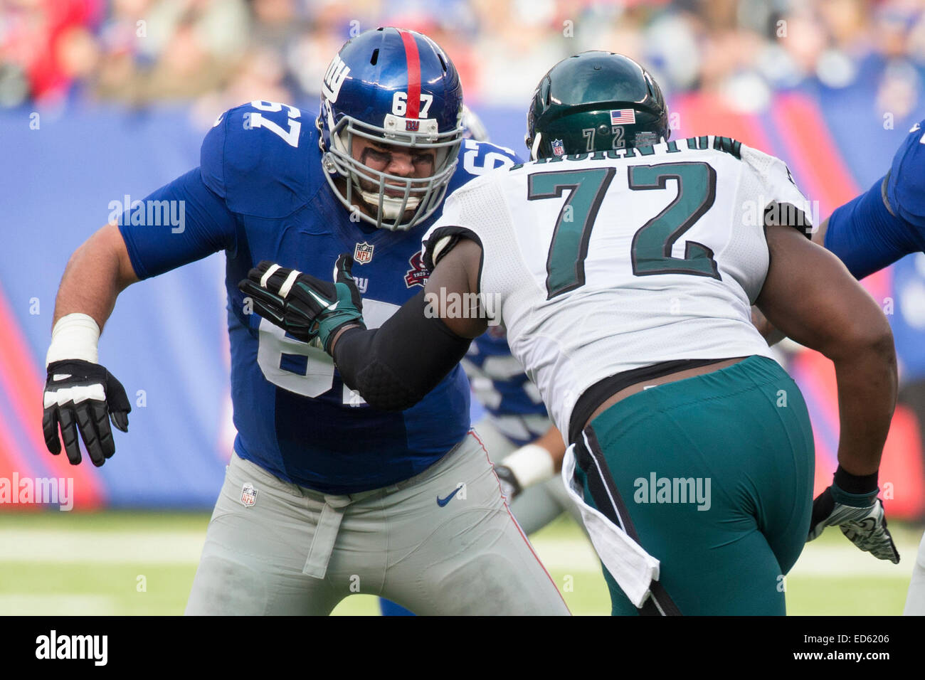 East Rutherford, New Jersey, USA. 28th December, 2014. New York Giants tackle Justin Pugh (67) in action against Philadelphia Eagles defensive end Cedric Thornton (72) during the NFL game between the Philadelphia Eagles and the New York Giants at MetLife Stadium in East Rutherford, New Jersey. The Philadelphia Eagles won 34-26. Credit:  Cal Sport Media/Alamy Live News Stock Photo