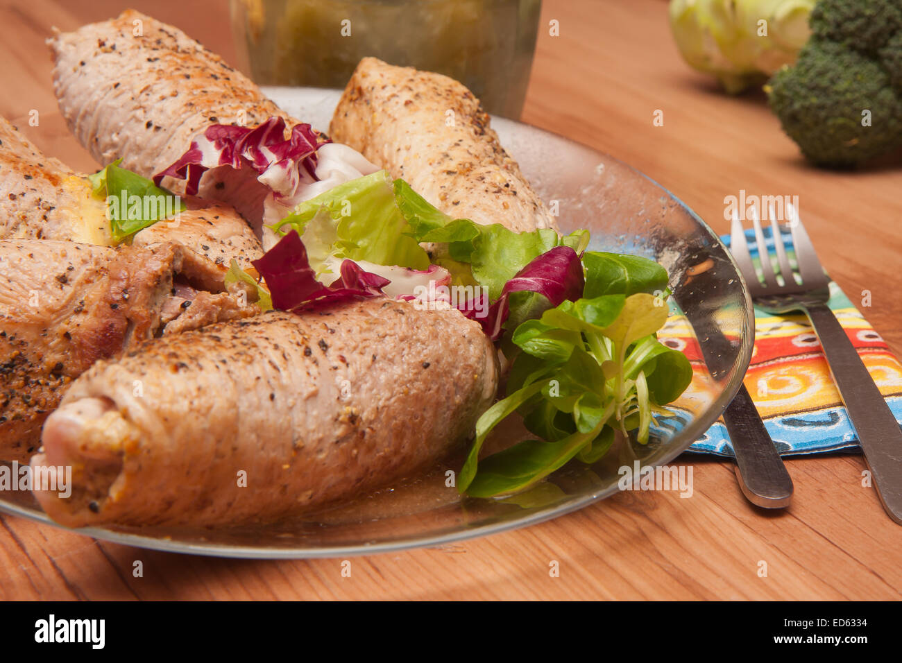 Dinner served. Meat rolls with rocket Stock Photo