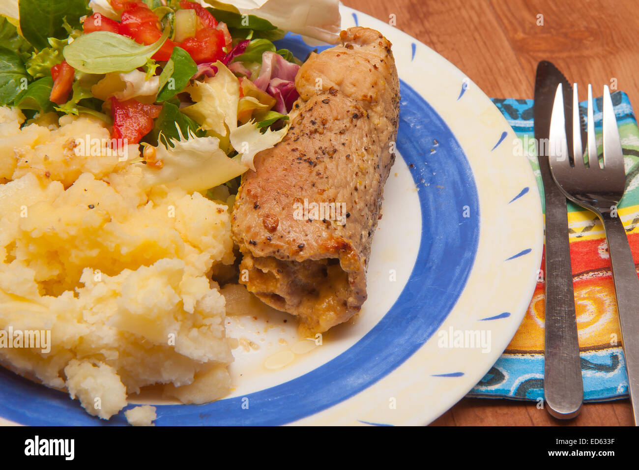 Dinner served. Meat rolls with potatoes and salad. Stock Photo