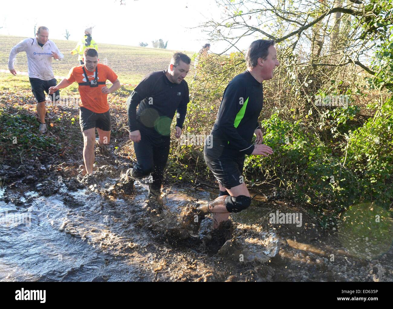 Chadlington, Oxfordshire, UK. 29th December, 2014. Prime Mininster David Cameron competes in The Great Brook Run which starts and finishes at The Tite Inn, Chadlington, Oxfordshire, UK.  Credit:  Denis Kennedy/Alamy Live News Stock Photo