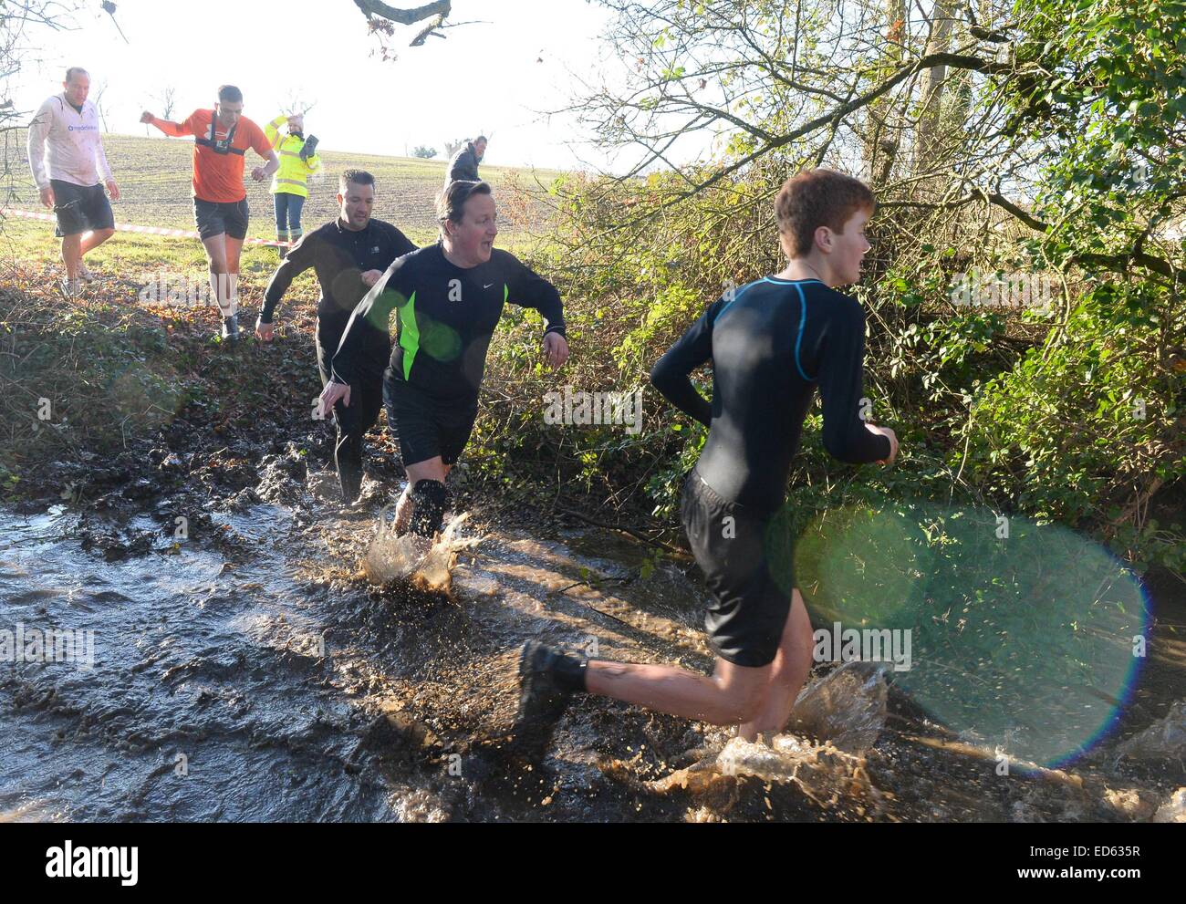 Chadlington, Oxfordshire, UK. 29th December, 2014. Prime Mininster David Cameron competes in The Great Brook Run which starts and finishes at The Tite Inn, Chadlington, Oxfordshire, UK.  Credit:  Denis Kennedy/Alamy Live News Stock Photo