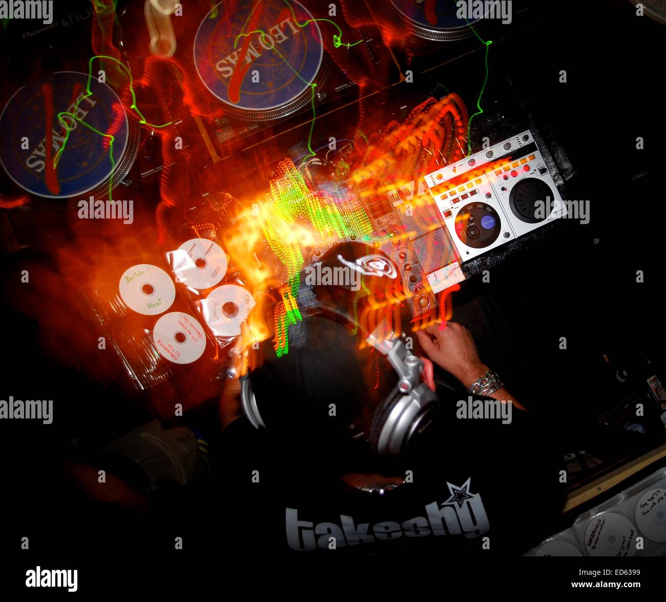 Disk jockey play music in DJ console at party Stock Photo Alamy