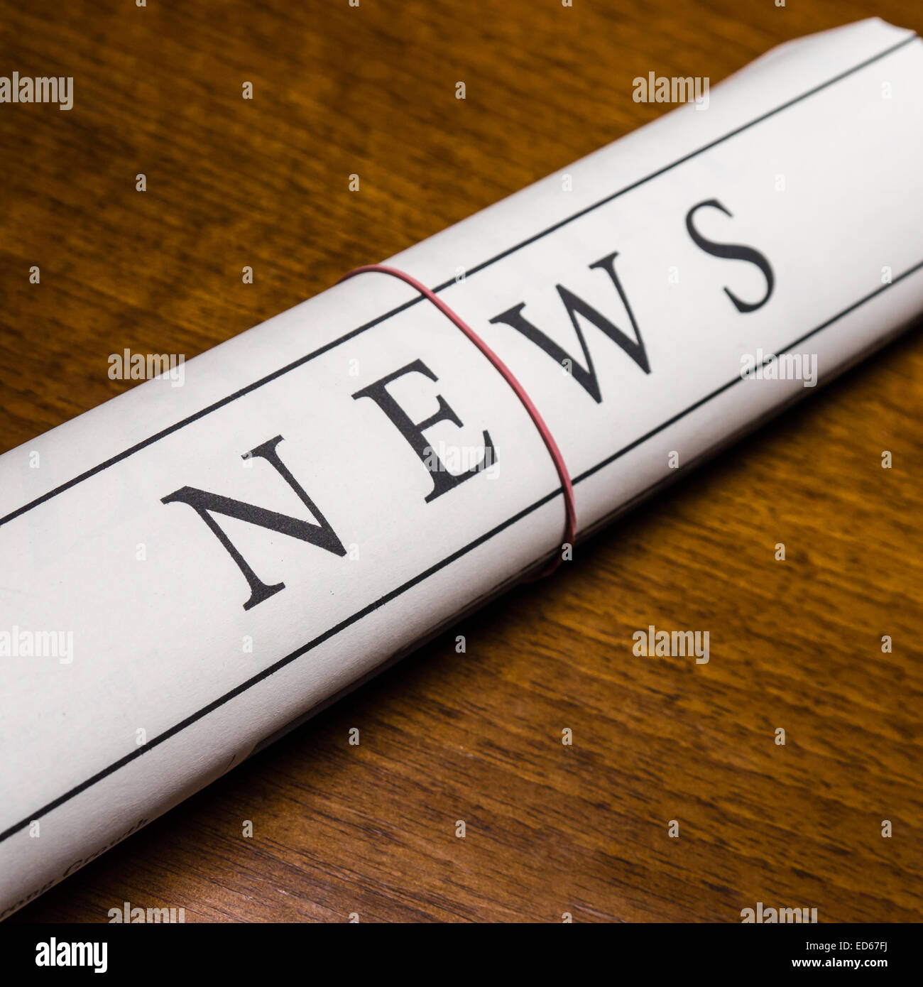 newspaper on wood desk Stock Photo