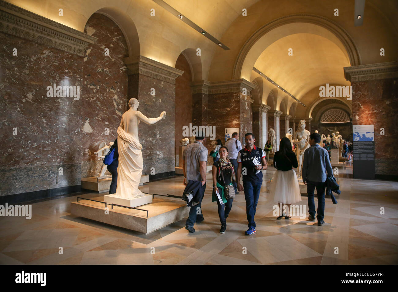 Louvre Museum interior tourists Stock Photo