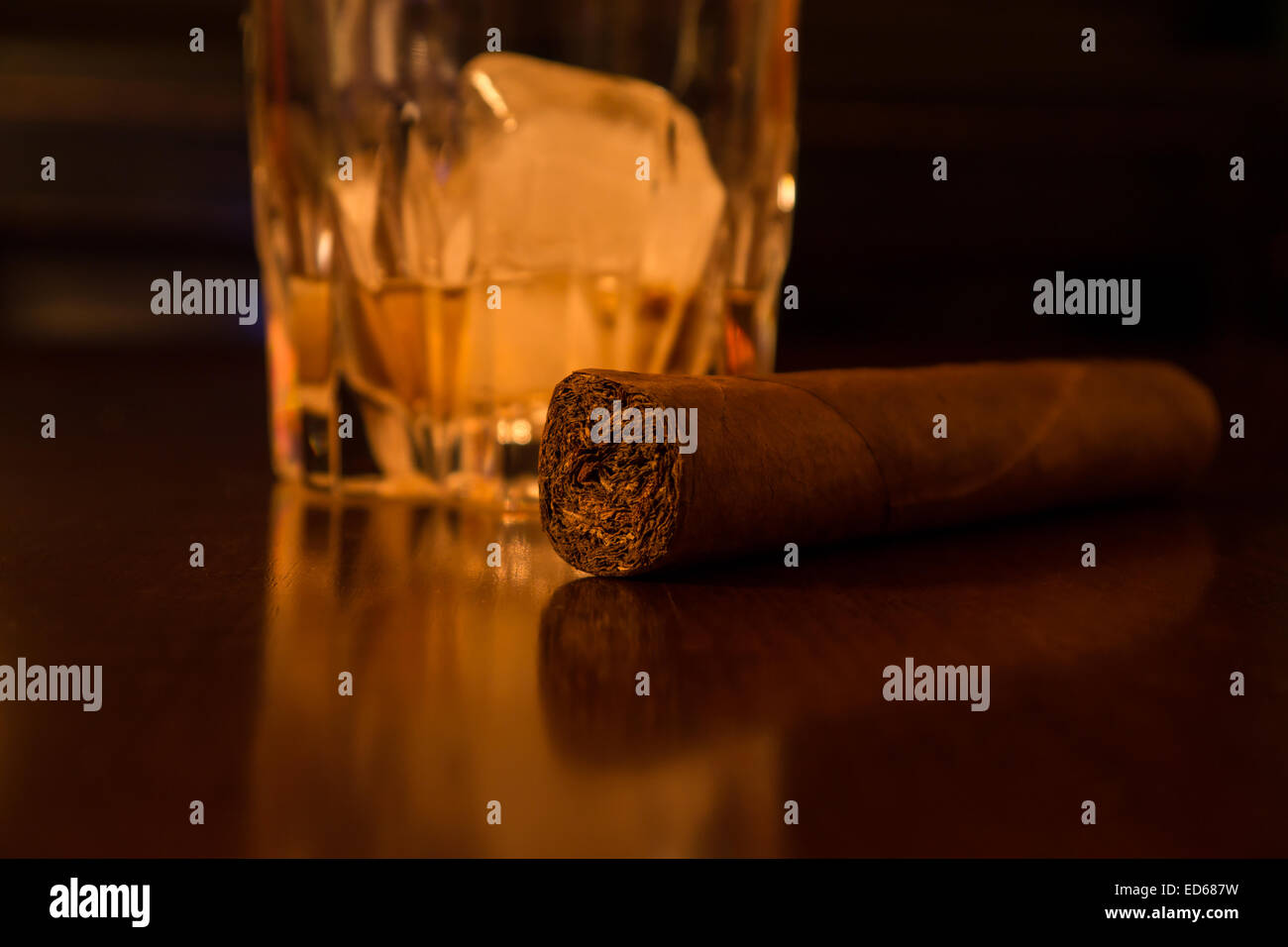 whiskey and cigar on desk Stock Photo