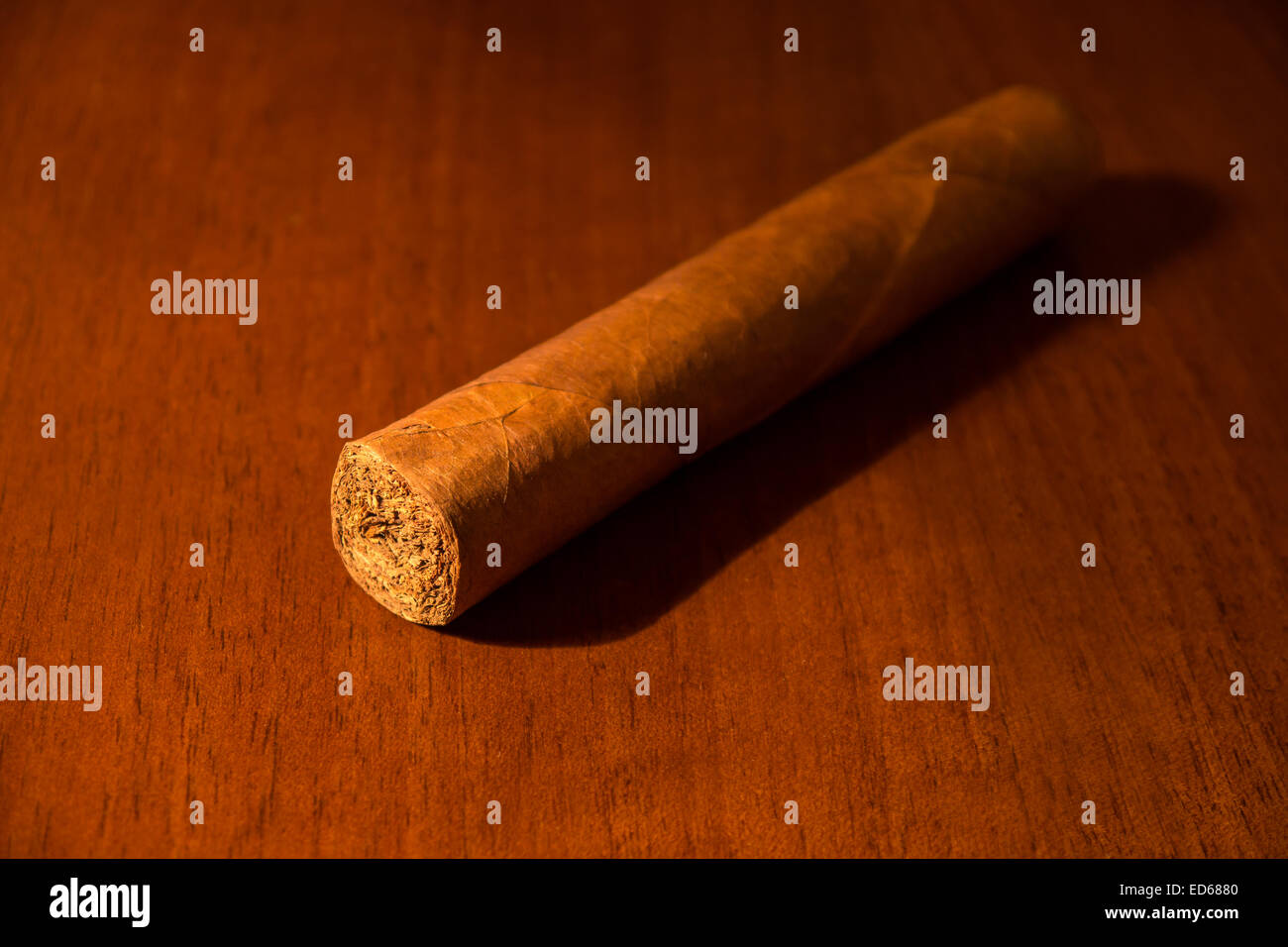 cigar on a wood desk Stock Photo