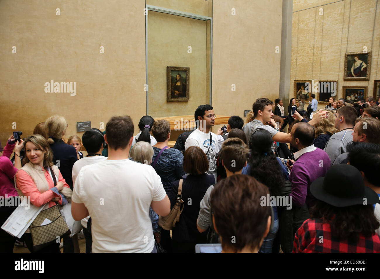 Mona Lisa Louvre museum crowd people tourists Stock Photo