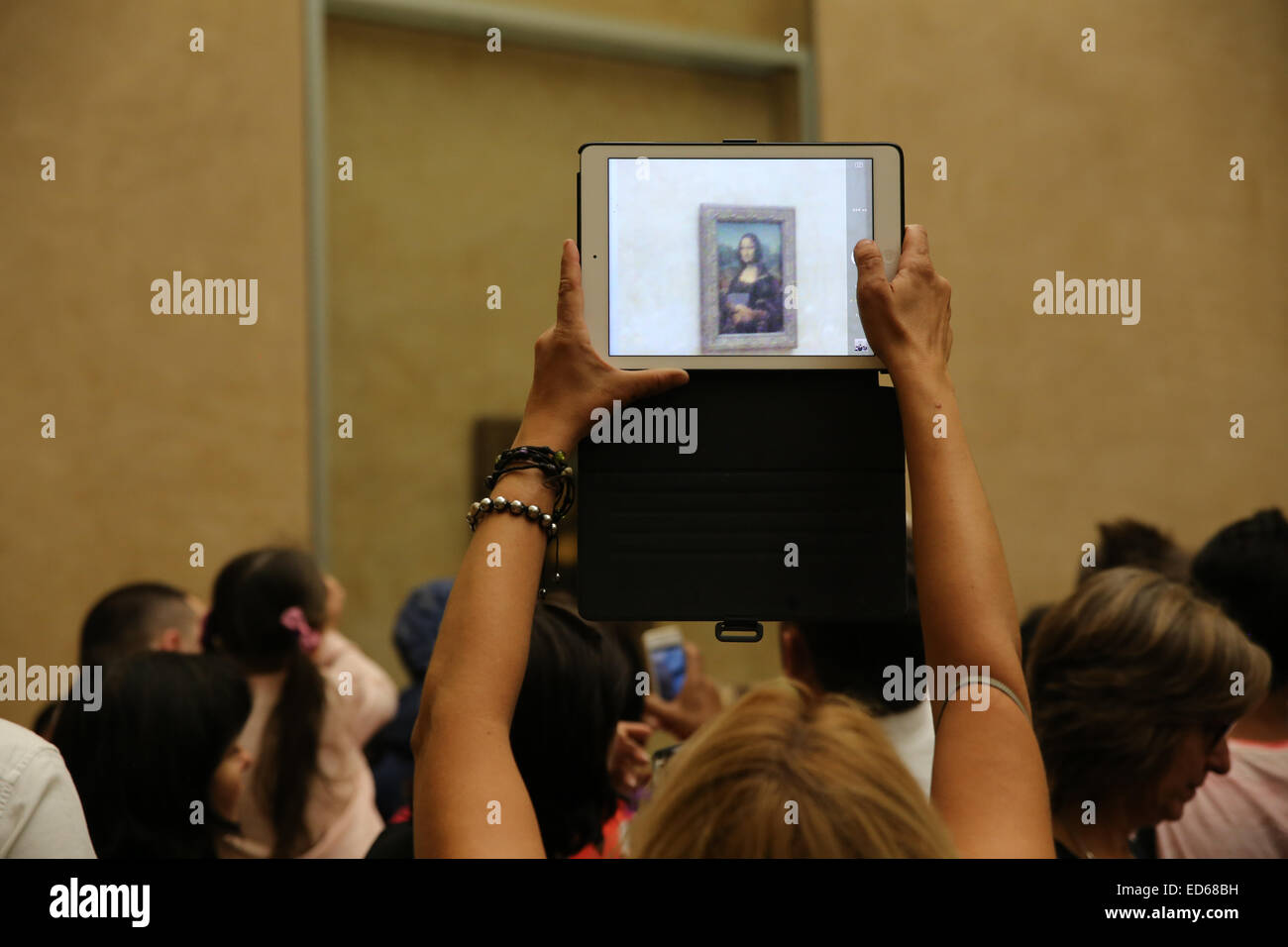taking picture Mona Lisa ipad Stock Photo