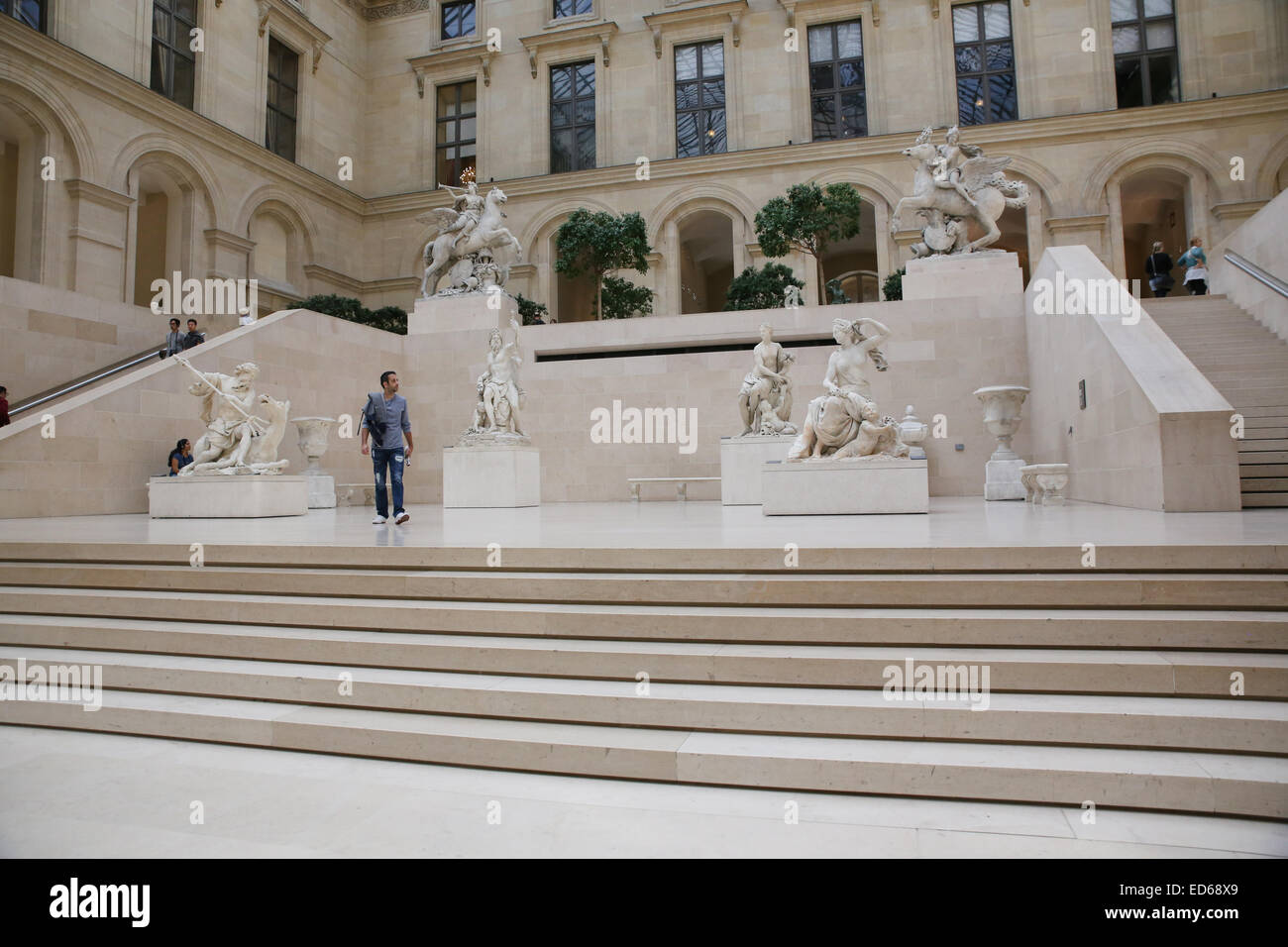 Louvre museum courtyard sculptures Stock Photo
