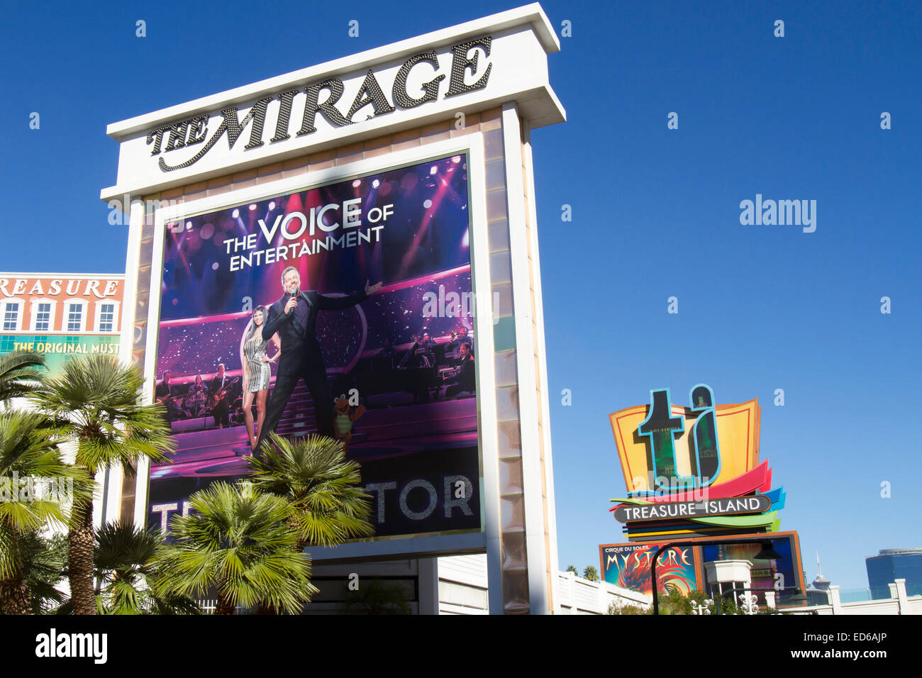Las Vegas, NV, USA - December 22, 2014 : Signs in front of the Mirage and Treasure Island resorts on the Las Vegas strip Stock Photo