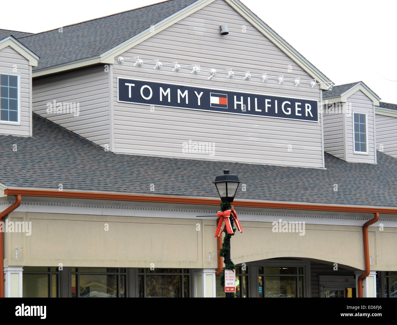 The shop sign for Tommy Hilfiger in Woodbury common Stock Photo - Alamy